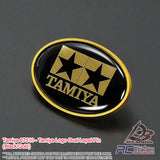 Tamiya #67510 - Tamiya Logo Oval Lapel Pin (Black/Gold) | Tamiya Original Goods
